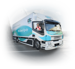 the greenroute pharmacare truck with smiling driver