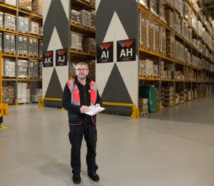 quality control personnel taking notes in warehouse